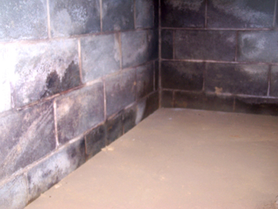 White powder basement wall foundation problem
